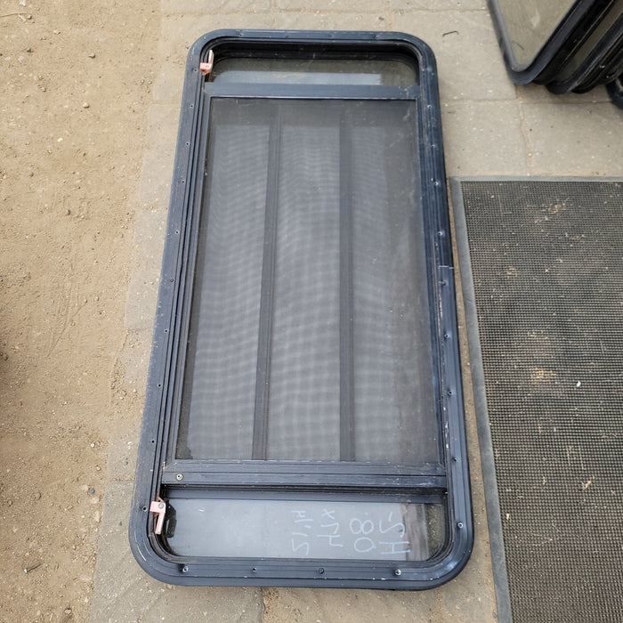 Used Black Radius Emergency Opening Window : 47 X 21 1/4 X 2 1/2" D - Young Farts RV Parts