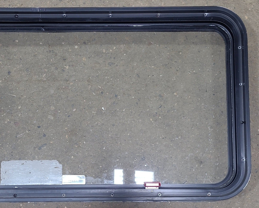 Used Black Radius Emergency Opening Window : 48 1/2" W x 21 3/4" H x 1 3/4" D