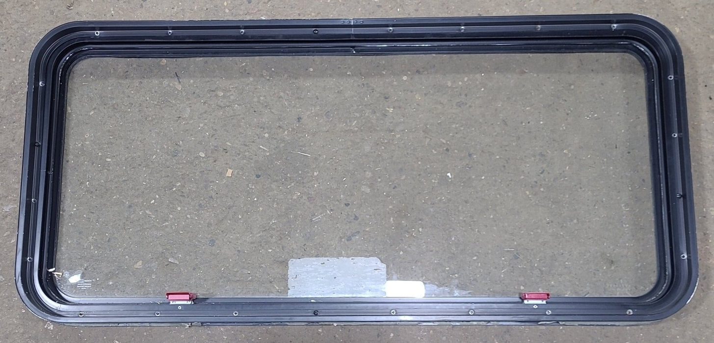 Used Black Radius Emergency Opening Window : 48 1/2" W x 21 3/4" H x 1 3/4" D