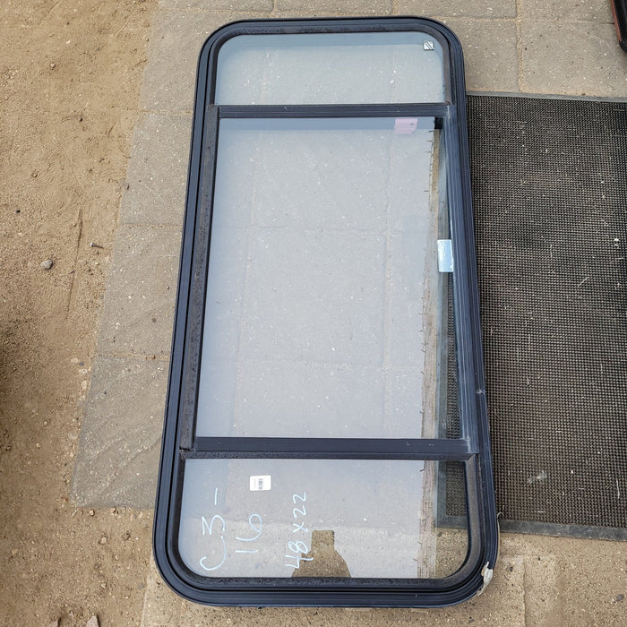 Used Black Radius Emergency Opening Window : 48 X 22 X 2" D - Young Farts RV Parts