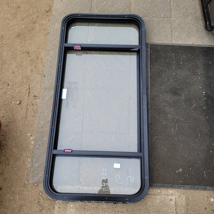 Used Black Radius Emergency Opening Window : 48 X 22 X 2" D - Young Farts RV Parts