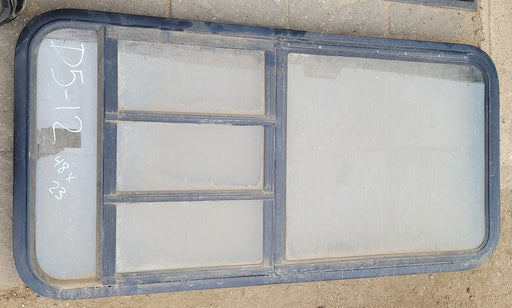 Used Black Radius Emergency Opening Window : 48 X 23 X 2" D - Young Farts RV Parts