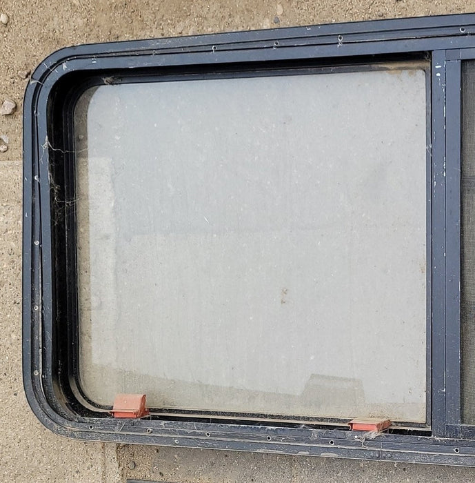 Used Black Radius Emergency Opening Window : 48 x 23 x 2" D - Young Farts RV Parts