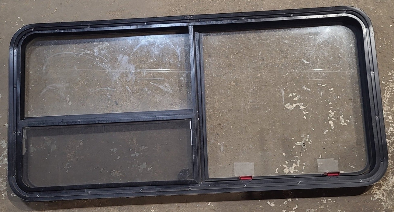Used Black Radius Emergency Opening Window : 53 1/2" W x 25 1/2" H x 1 7/8" D