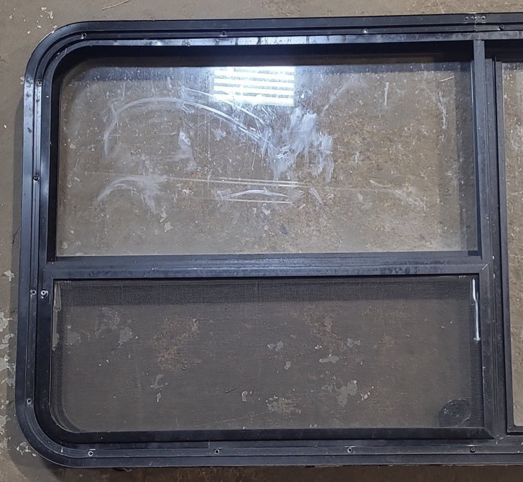 Used Black Radius Emergency Opening Window : 53 1/2" W x 25 1/2" H x 1 7/8" D