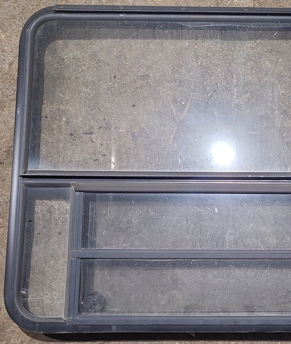 Used Black Radius Emergency Opening Window : 53 1/2" W x 34 3/4" H x 1 1/4" D