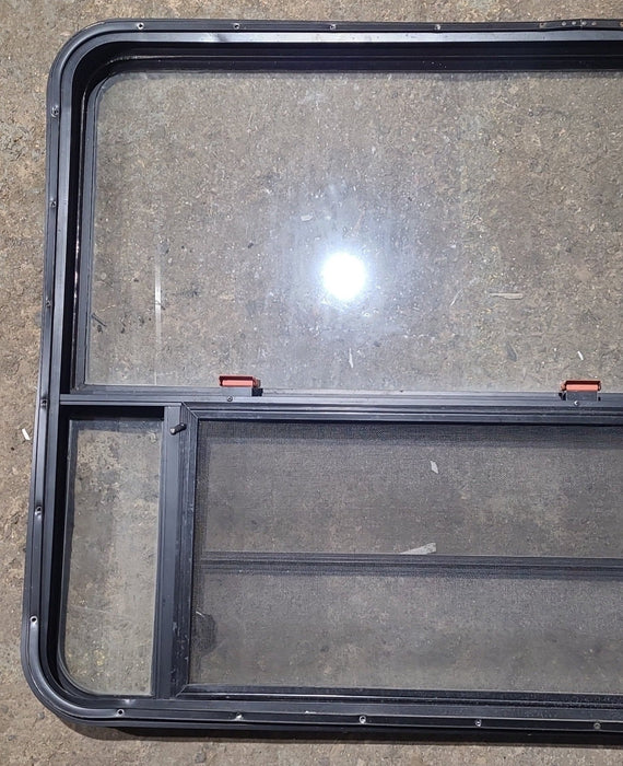 Used Black Radius Emergency Opening Window : 53 1/2" W x 34 3/4" H x 1 1/4" D