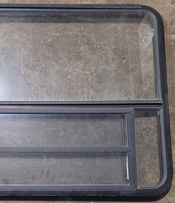 Used Black Radius Emergency Opening Window : 53 1/2" W x 34 3/4" H x 1 1/4" D