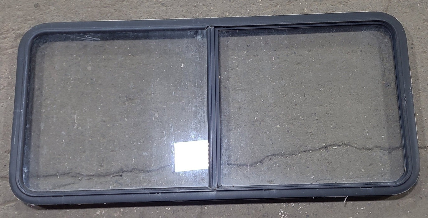 Used Black Radius Emergency Opening Window : 55 1/2" W x 25 1/2" H x 1 7/8" D