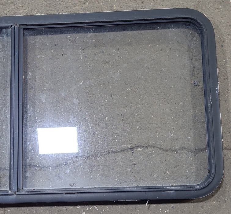 Used Black Radius Emergency Opening Window : 55 1/2" W x 25 1/2" H x 1 7/8" D