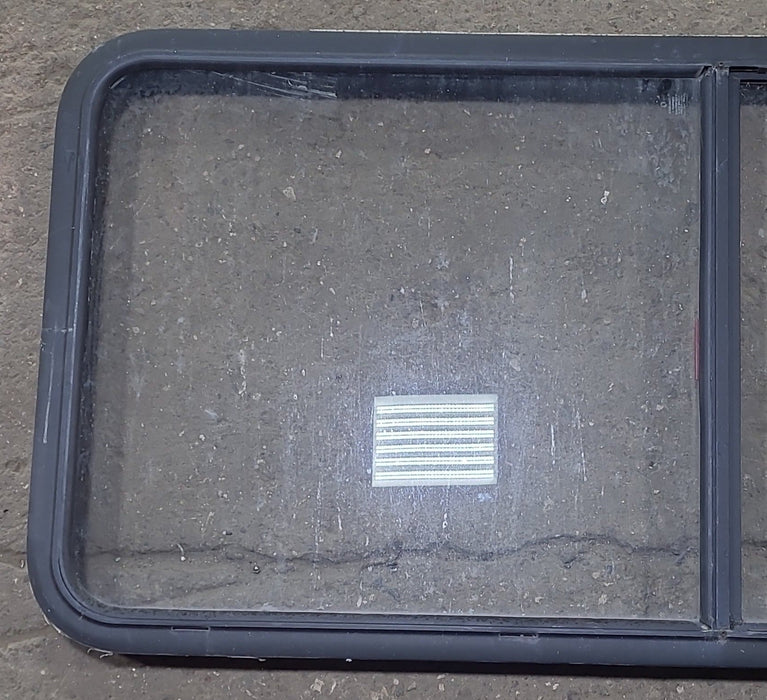 Used Black Radius Emergency Opening Window : 55 1/2" W x 25 1/2" H x 1 7/8" D