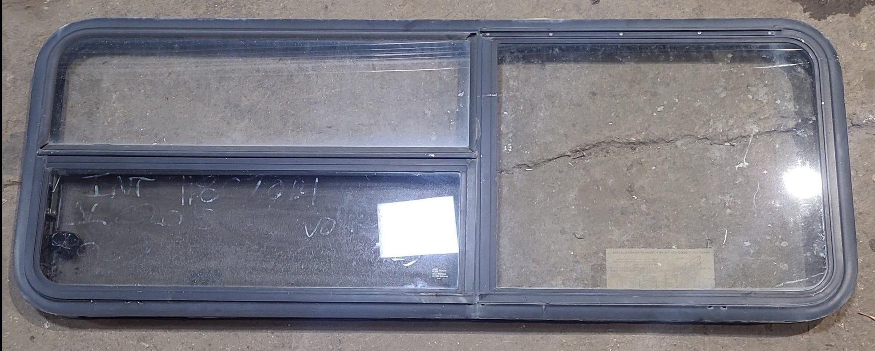 Used Black Radius Emergency Opening Window : 59 1/2" W x 21 1/2" H x 1 7/8" D