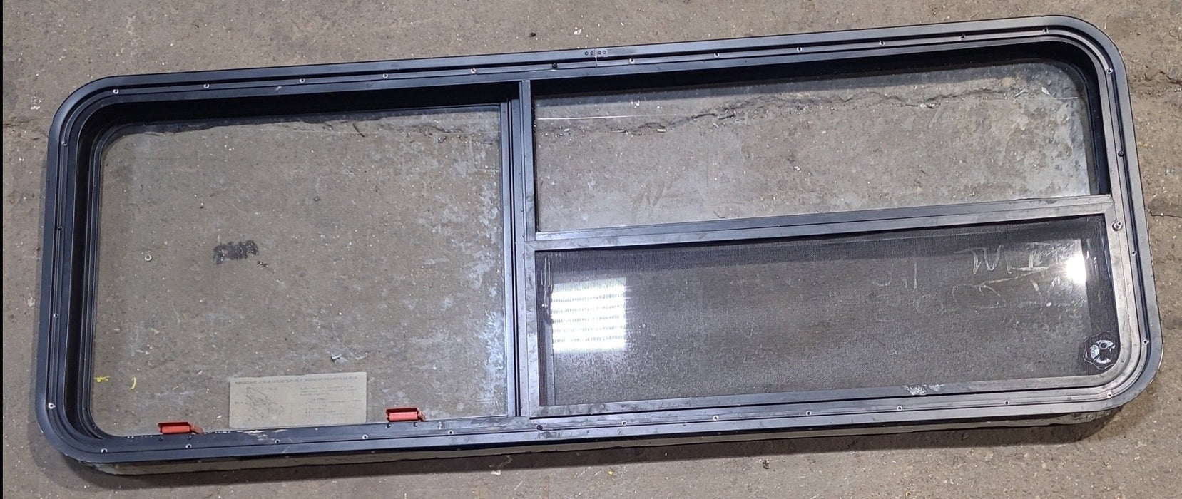 Used Black Radius Emergency Opening Window : 59 1/2" W x 21 1/2" H x 1 7/8" D