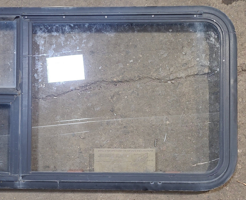 Used Black Radius Emergency Opening Window : 59 1/2" W x 21 1/2" H x 1 7/8" D