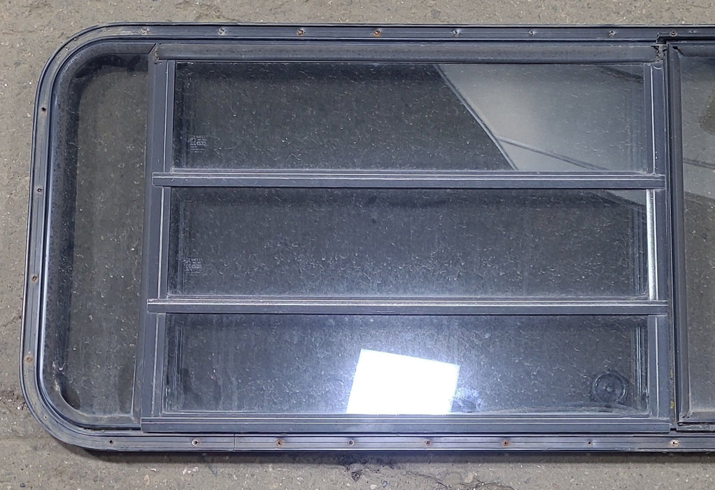 Used Black Radius Emergency Opening Window : 60 3/4" W x 23" H x 1 3/8" D