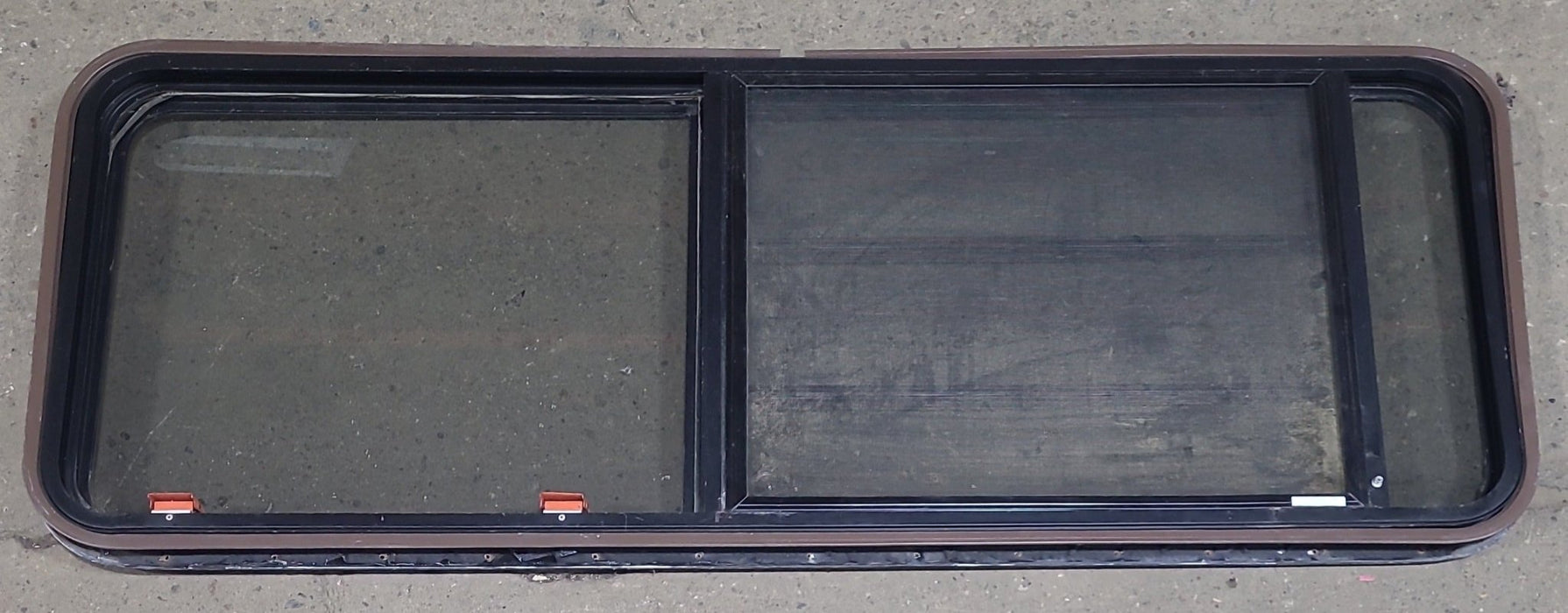 Used Black Radius Emergency Opening Window : 60 3/4" W x 23" H x 1 3/8" D