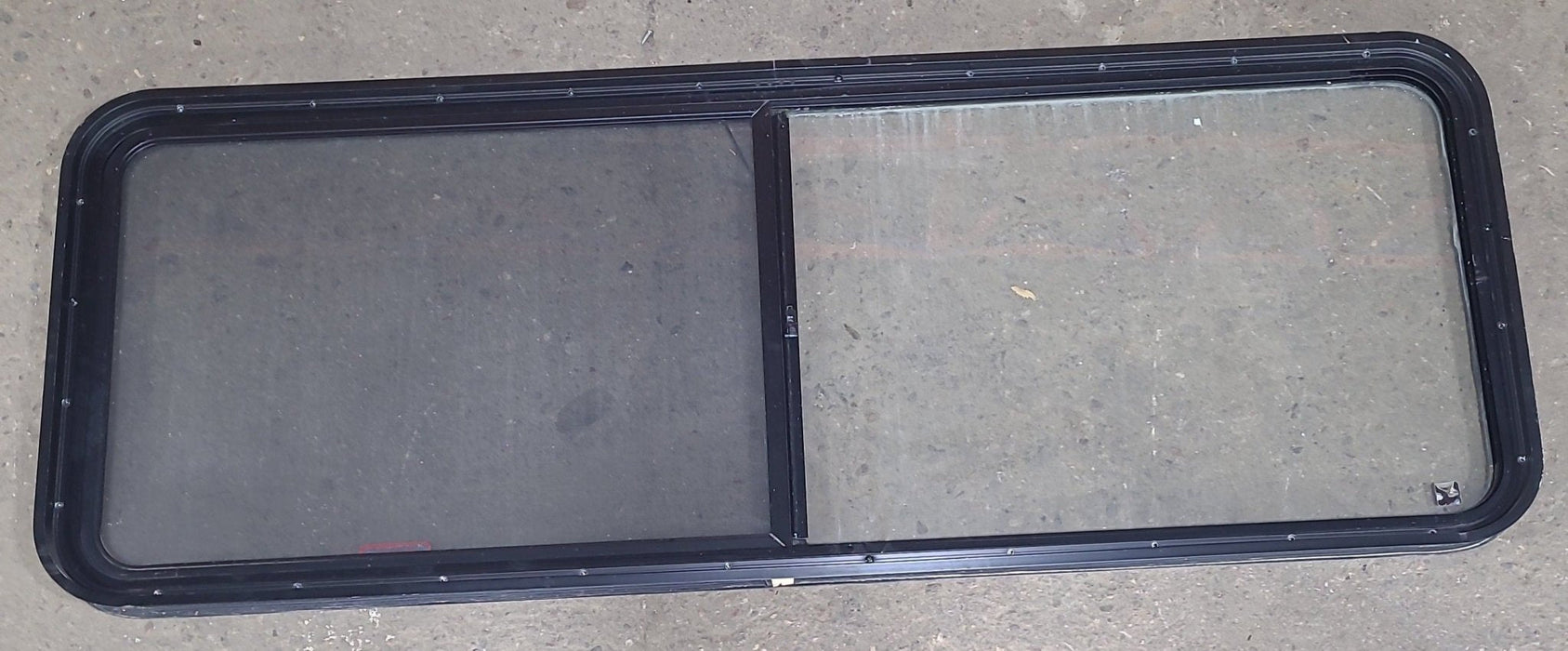Used Black Radius Emergency Opening Window : 60 3/8" W x 21 3/4" H x 1 3/4" D