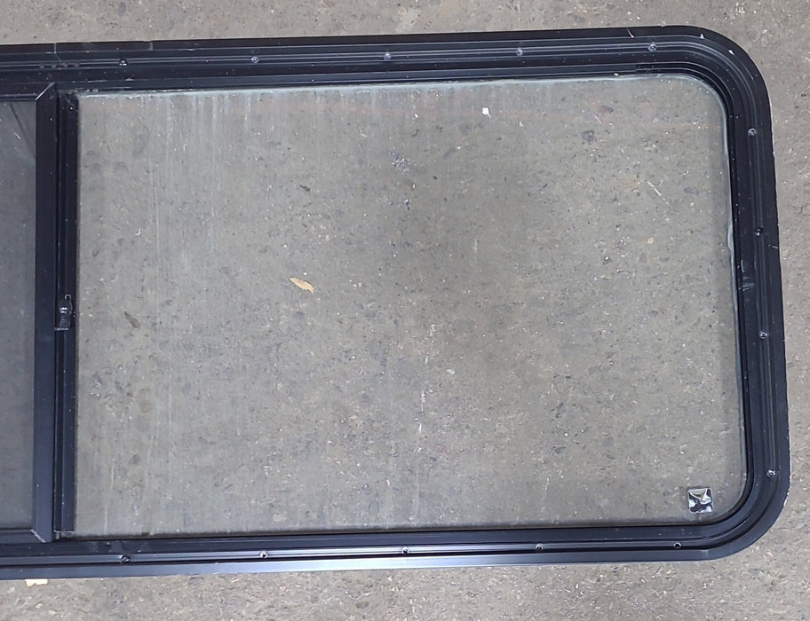 Used Black Radius Emergency Opening Window : 60 3/8" W x 21 3/4" H x 1 3/4" D