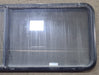 Used Black Radius Emergency Opening Window : 60 3/8" W x 21 3/4" H x 1 3/4" D - Young Farts RV Parts