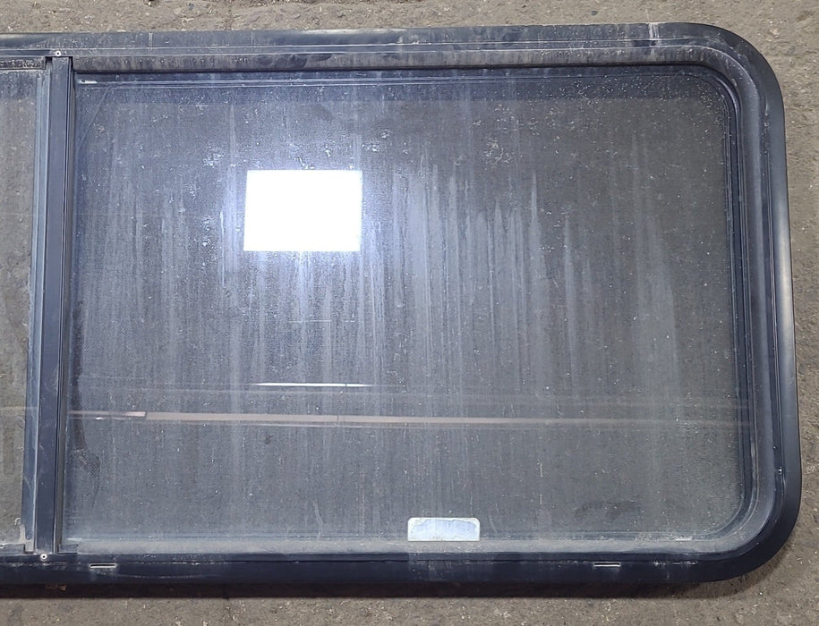 Used Black Radius Emergency Opening Window : 60 3/8" W x 21 3/4" H x 1 3/4" D