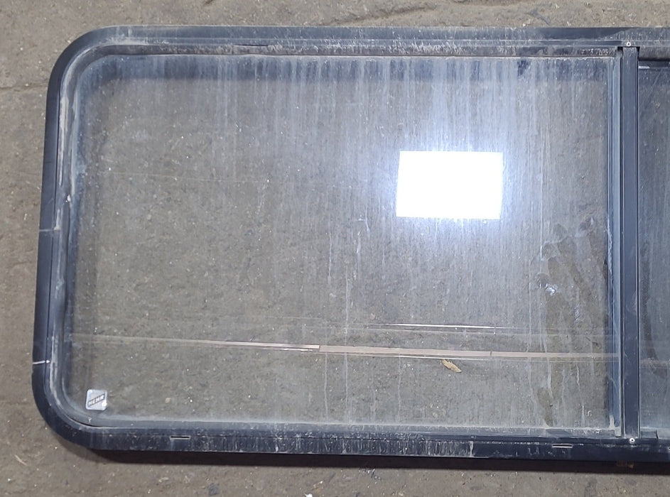 Used Black Radius Emergency Opening Window : 60 3/8" W x 21 3/4" H x 1 3/4" D