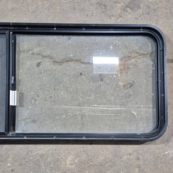 Used Black Radius Emergency Opening Window - 60.25 X 21.75 X 1.75