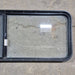 Used Black Radius Emergency Opening Window - 60.25 X 21.75 X 1.75 - Young Farts RV Parts