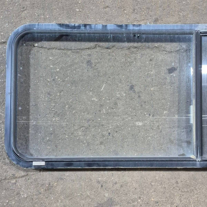 Used Black Radius Emergency Opening Window - 60.25 X 21.75 X 1.75