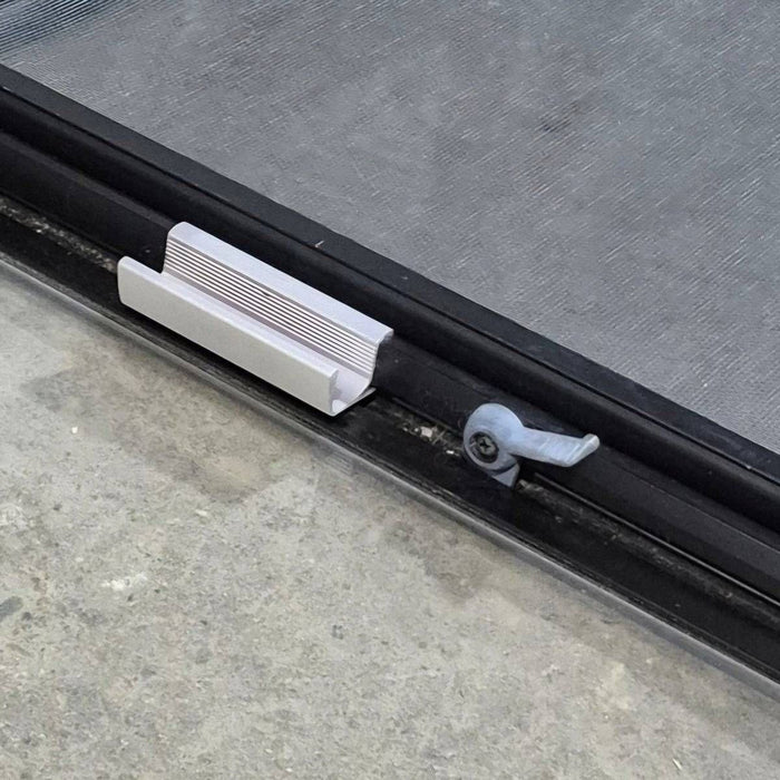 Used Black Radius Emergency Opening Window - 60.25 X 21.75 X 1.75