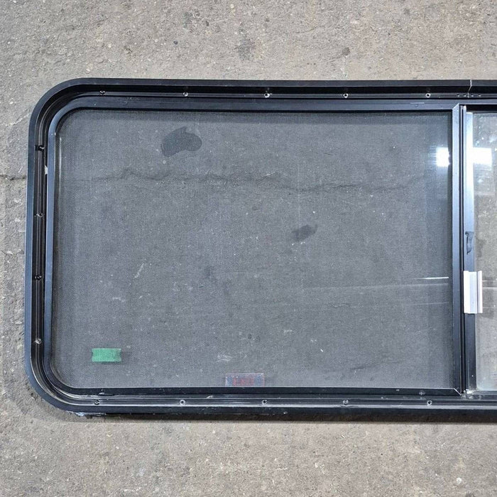 Used Black Radius Emergency Opening Window - 60.25 X 21.75 X 1.75