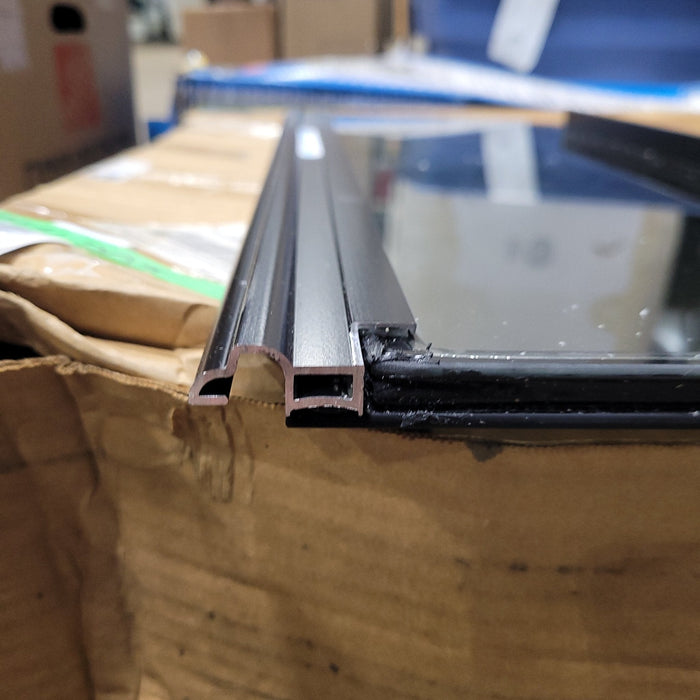 Used Black Radius Frameless Opening Window : 24 1/2" X 10 1/2" X  1/2" D