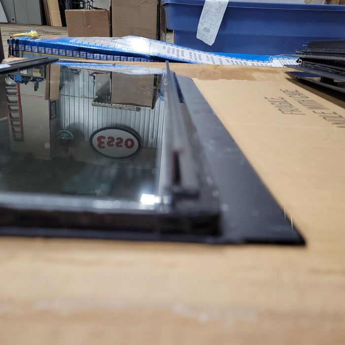 Used Black Radius Frameless Opening Window : 24 1/2" X 10 1/2" X  1/2" D