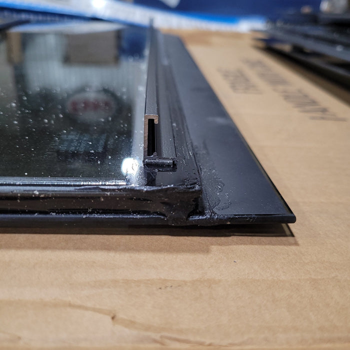 Used Black Radius Frameless Opening Window : 24 1/2" X 10 1/2" X  1/2" D