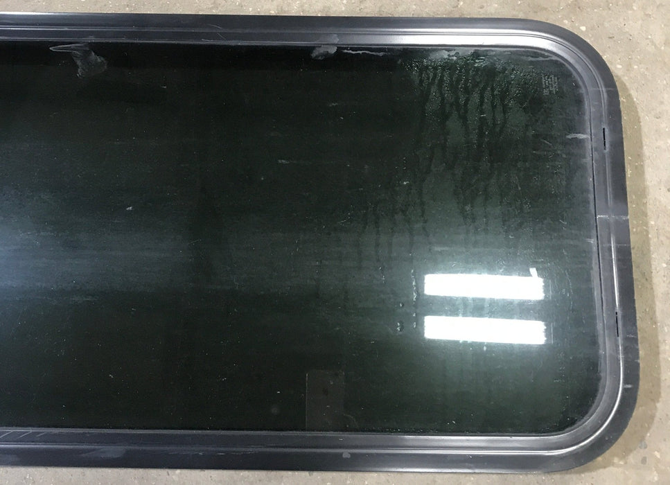 Used Black Radius Non Opening Window : 17 1/2" W x 39 1/2" H x 1 7/8" D