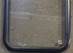 Used Black Radius Non Opening Window : 18 1/4" W x 26" H x 1 1/2" D - Young Farts RV Parts