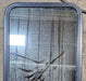 Used Black Radius Non Opening Window : 21 3/4" W x 42 1/4" H x 2" - Young Farts RV Parts