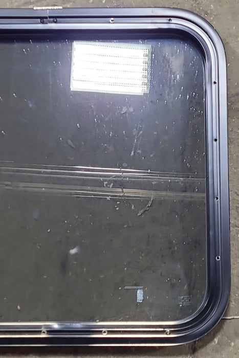 Used Black Radius Non Opening Window : 23 1/2" W x 21 1/2" H x 1 3/4" D - Young Farts RV Parts