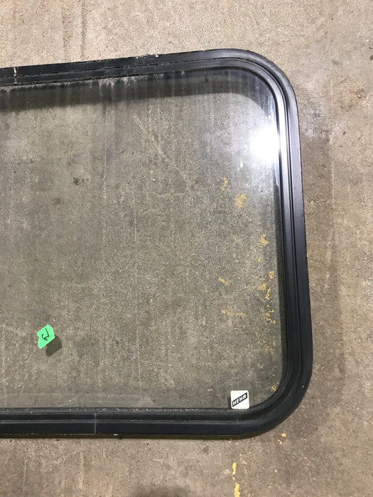 Used Black Radius Non Opening Window : 23 1/2" W x 22" H x 1 7/8"