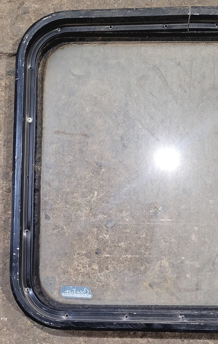Used Black Radius Non - Opening Window : 23 1/4" W x 21 1/2" H x 1 7/8" D - Young Farts RV Parts