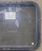 Used Black Radius Non Opening Window : 24 1/2" W x 23" H x 1 1/2" D - Young Farts RV Parts