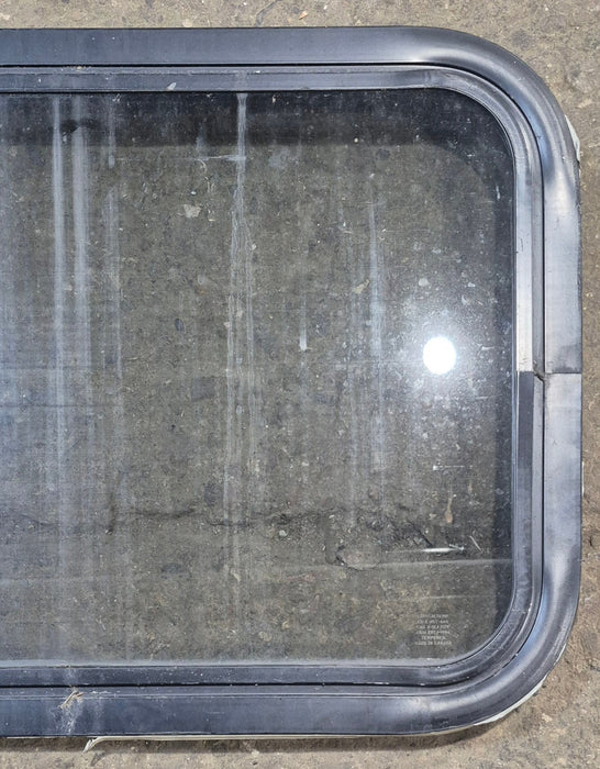 Used Black Radius Non Opening Window : 24 1/4" W x 16 3/4" H x 1 7/8"