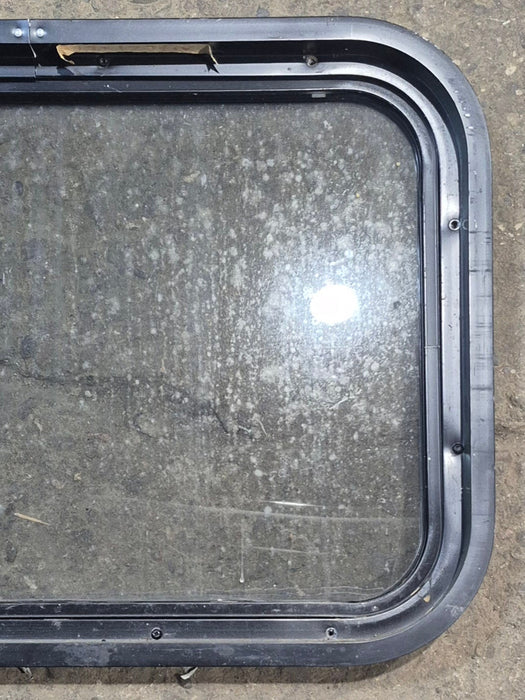 Used Black Radius Non Opening Window : 24 1/4" W x 16 3/4" H x 1 7/8"