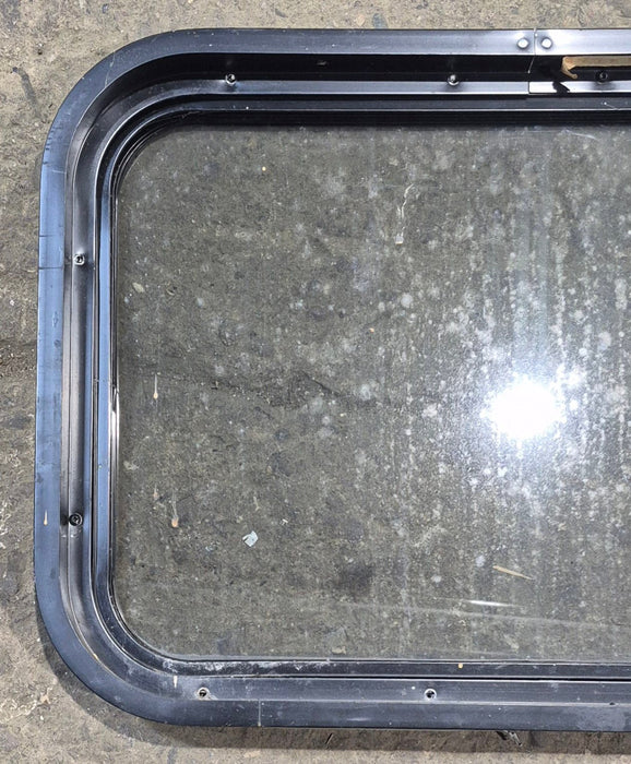 Used Black Radius Non Opening Window : 24 1/4" W x 16 3/4" H x 1 7/8"