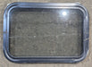 Used Black Radius Non Opening Window : 24 1/4" W x 16 3/4" H x 1 7/8" - Young Farts RV Parts