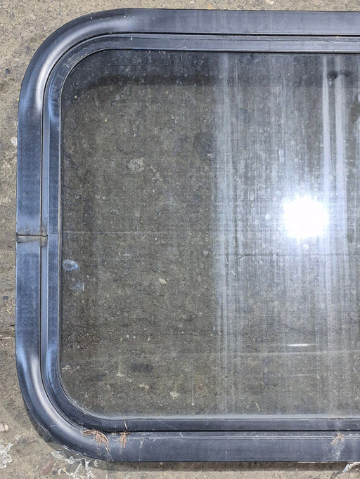 Used Black Radius Non Opening Window : 24 1/4" W x 16 3/4" H x 1 7/8" - Young Farts RV Parts