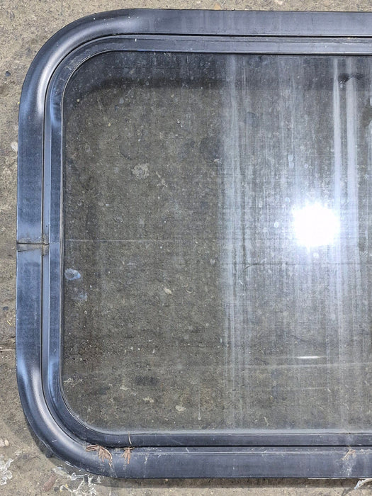 Used Black Radius Non Opening Window : 24 1/4" W x 16 3/4" H x 1 7/8"