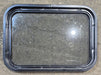 Used Black Radius Non Opening Window : 24 1/4" W x 16 3/4" H x 1 7/8" - Young Farts RV Parts