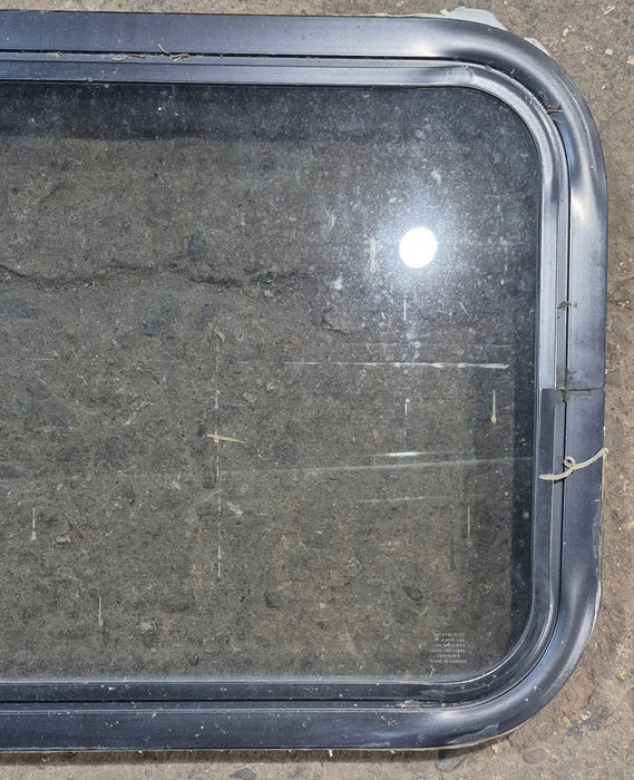 Used Black Radius Non Opening Window : 24 1/4" W x 16 3/4" H x 1 7/8" - Young Farts RV Parts
