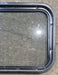 Used Black Radius Non Opening Window : 24 1/4" W x 16 3/4" H x 1 7/8" - Young Farts RV Parts