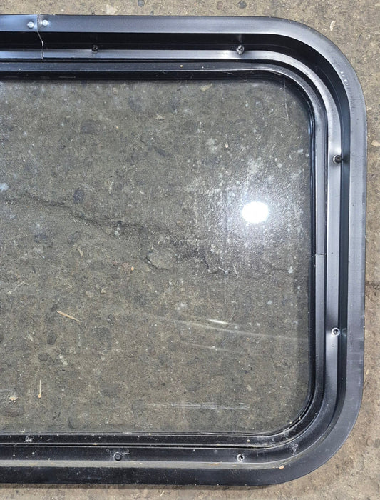 Used Black Radius Non Opening Window : 24 1/4" W x 16 3/4" H x 1 7/8"